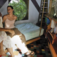 Shawnee Chasser, left, and daughter Wren Levy share a laugh while posing in a bedroom in Chasser’s treehouse Sunday, Aug. 5, 2007, in Miami. Photo via AP.